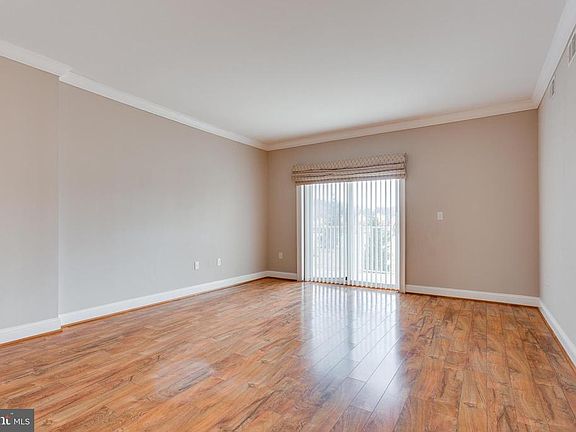 Living room with sliding door to private balcony