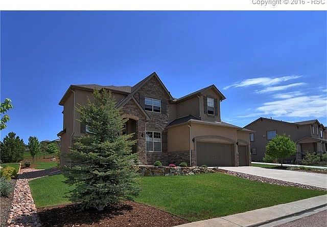 Great location with commanding views from front and side of home. Backs to Toscana in Flying Horse.