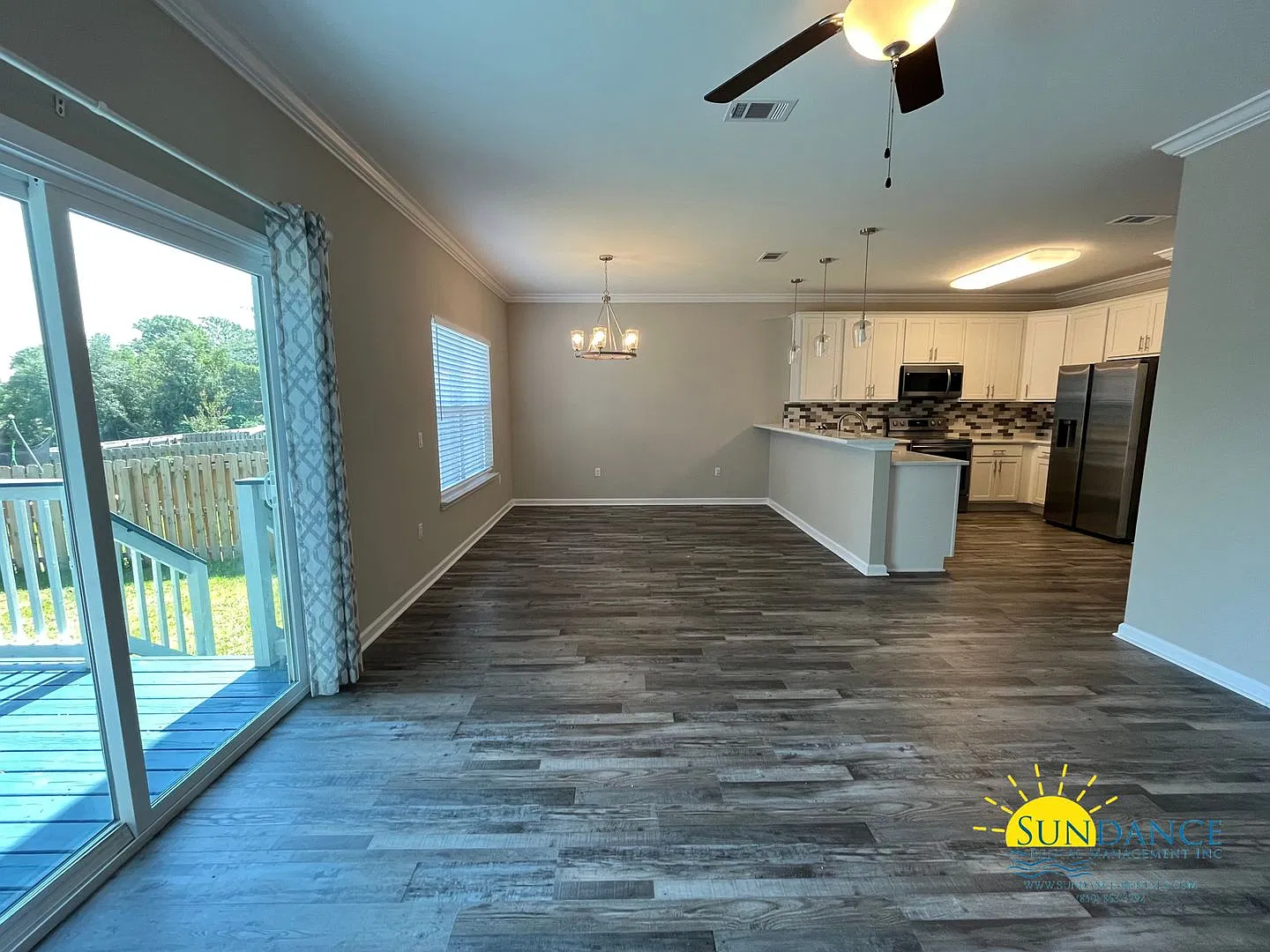Gorgeous 3 Bedroom Home with Cozy Deck & Backyard! — Photo 4