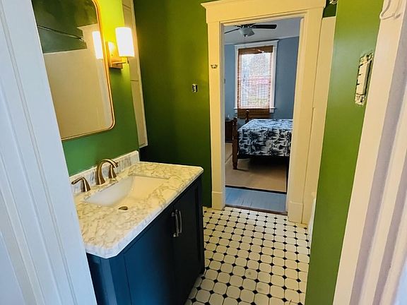 bathroom and adjoining bedroom