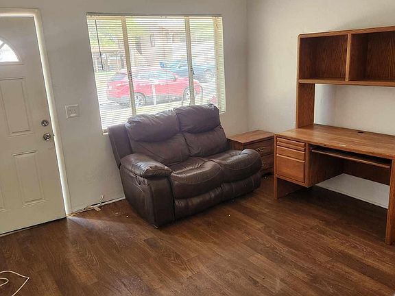living room front door and window