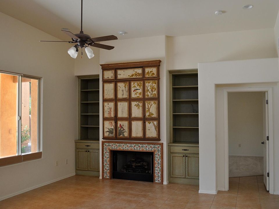 Art Panels in Great Room conceal niche for Flat Panel TV