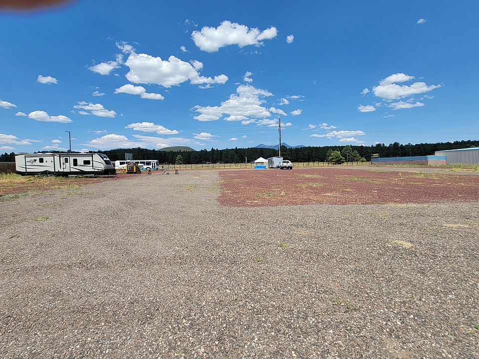 Photo taken before fencing, for better view of lot area. Great for construction material yard, equipment yard, and more. currently County approved for RV Storage.