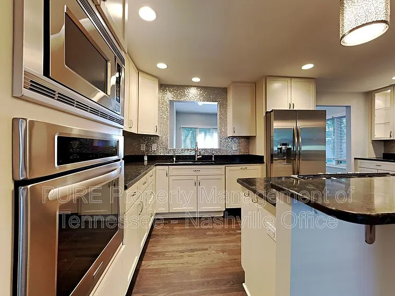 3818 Woodmont Ln — Photo 9