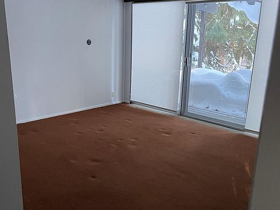 Bedroom #2 with private bath. Outdoor deck access