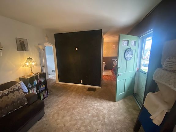 Living Room view 2 showing Black "mark on" wall if you wish