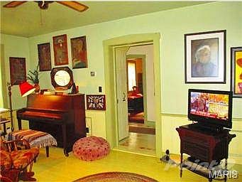 View of entrance to living room and portion of front entrance.