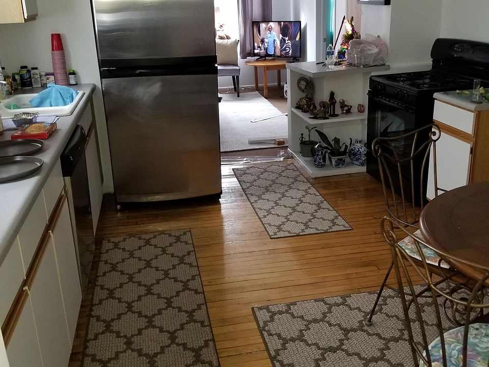 Kitchen looking to living room, or front of the apt