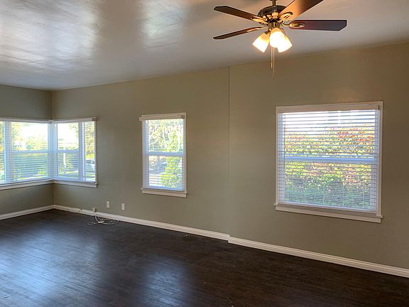 The great room with 9ft ceilings throughout the apartment. This apartment has 12 windows.