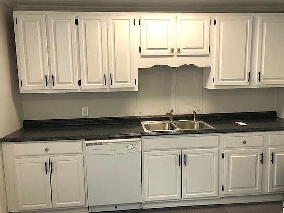 LED lighting in kitchen with new stainless steel sink and faucet