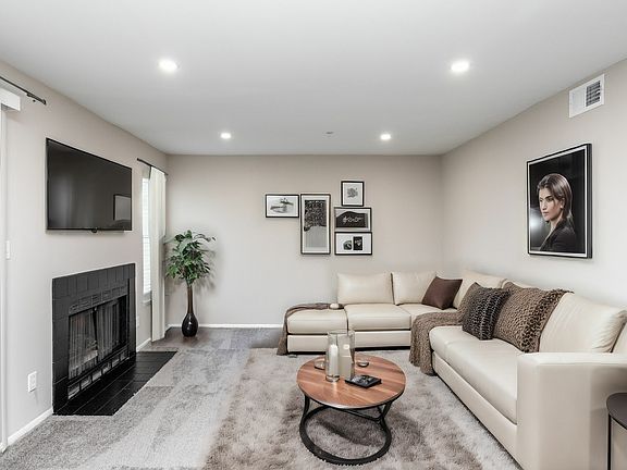 Expansive living areas with accent fireplace and upgraded design