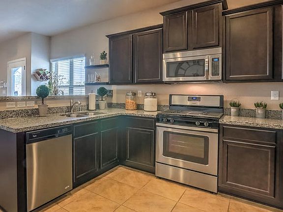 Stunning stainless appliances will make cooking a breeze.
