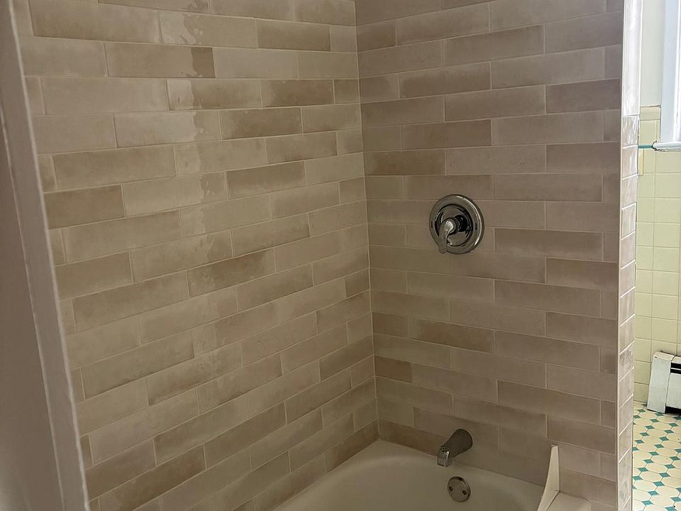 Newly Renovate Bathroom with Tub and Shower