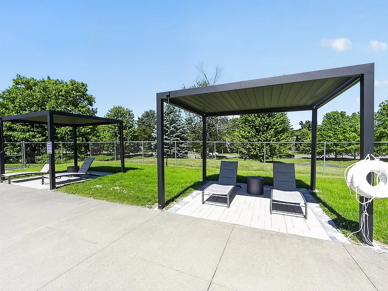 Find your perfect retreat at Lake Shore Park Apartments. Enjoy the serene outdoor lounges, perfect for relaxation or social gatherings surrounded by lush greenery. Discover your ideal lifestyle todayschedule a visit!