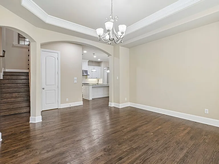 Dining Room - Notice the beautiful nail down hard wood floors.