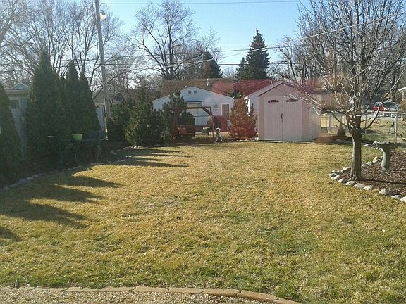 Backyard with Fire pit/Swing