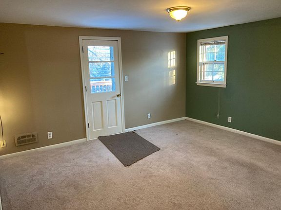 FRONT LIVING ROOM ACCESS TO SUN PORCH