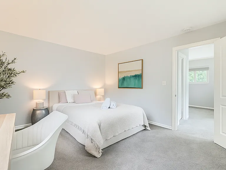 This queen bedroom is the definition of calm and comfort