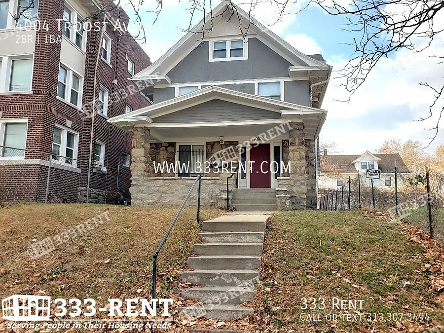 Large converted duplex close to UMKC & Rockhurst with old-world charm and stunning extras through... — Photo 2