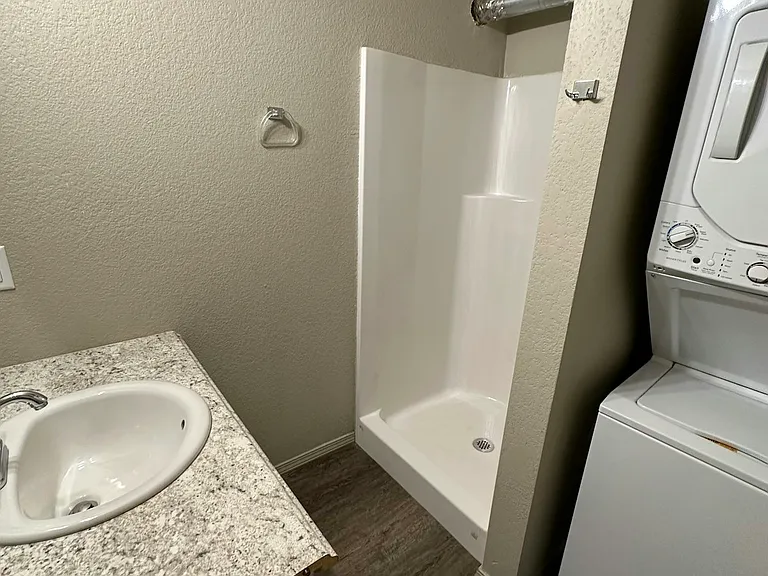 Bathroom with washer and dryer