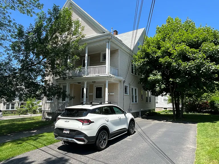 Floor one comes with left side of driveway and fits two cars. Front porches are brand new. Photo does not show new porches..
