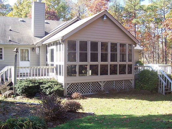 Home is great for entertaining with this screened in porch.