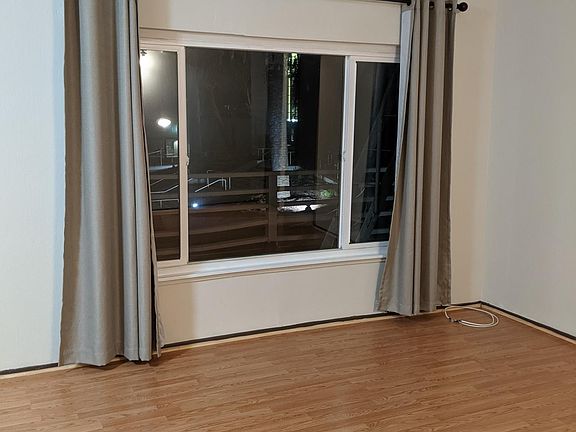 Living room, new hardwood floors and double paned windows