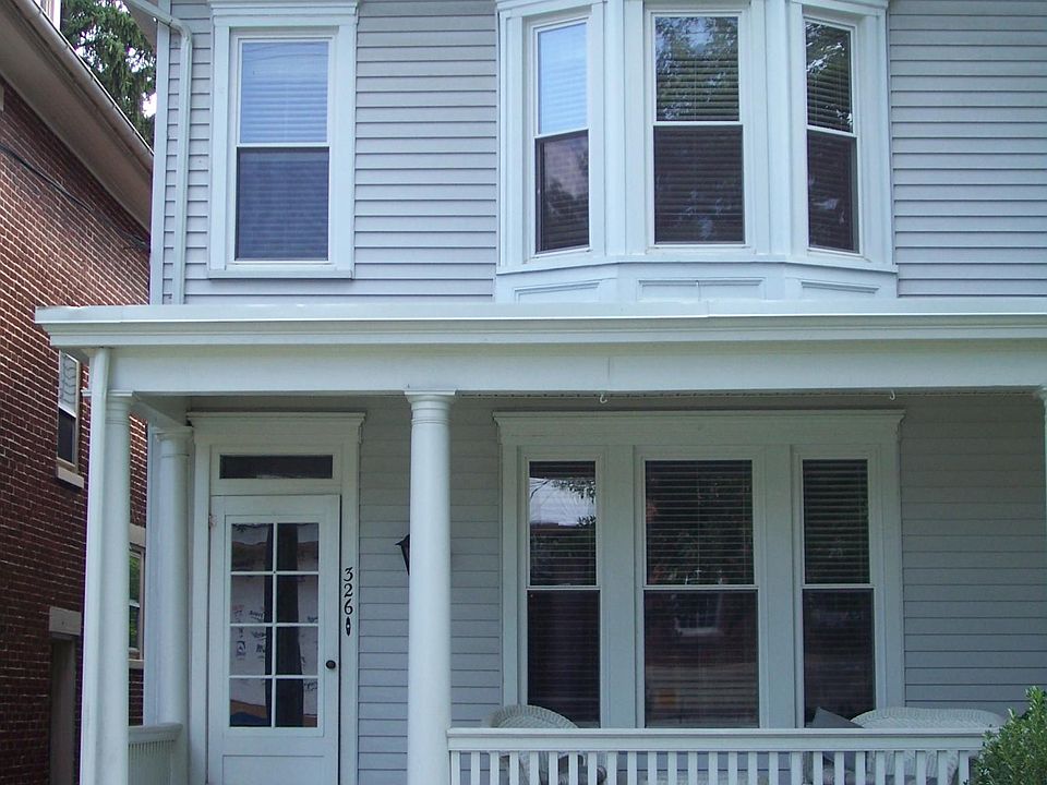 Front of house.  Porch furniture stays with the property.