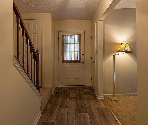 Inviting entry welcomes you into this spacious floorplan that offers many possibilities.