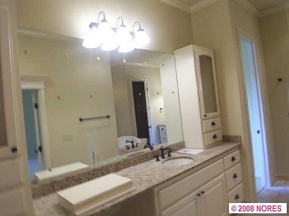 The Master Suite includes a double sided fireplace shared with the bath.