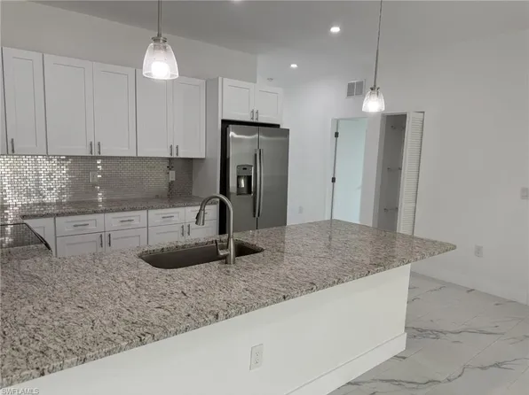 5253-5255 Centennial BLVD, LEHIGH ACRES, FL 33971