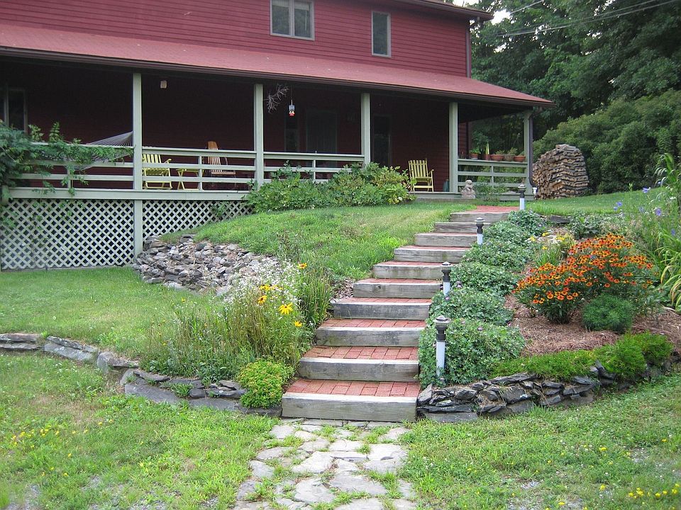front door with brick walkway