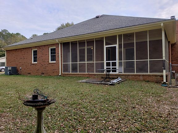 Rear with screened porch 