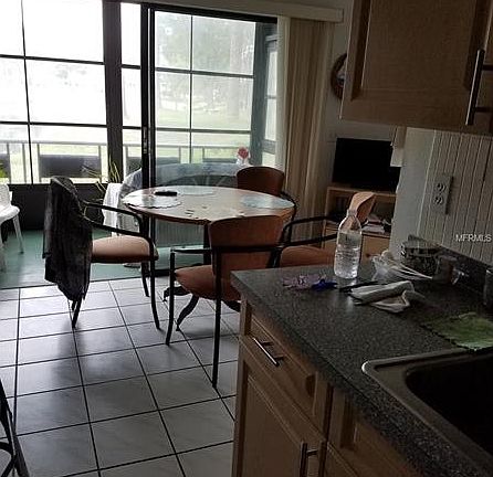 4th image of 7975 58th Ave N Unit 110