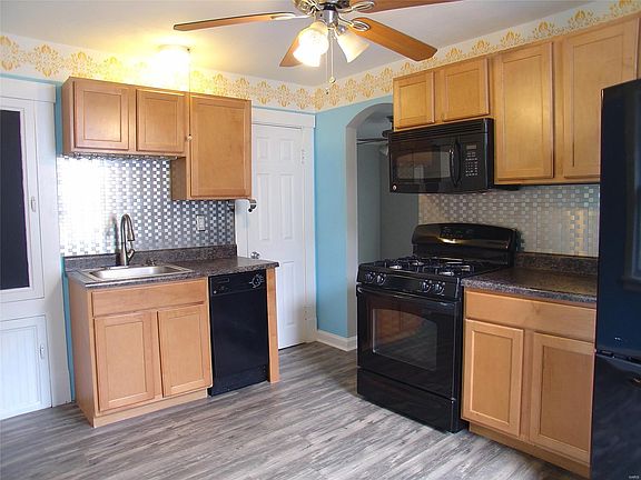 Here is another photo of the kitchen. You can see the apartment size dishwasher. The door to the right is one of the 2 pantries 
