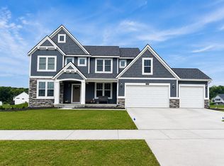 12103 Harvest Home Dr SE, Lowell, MI 49331