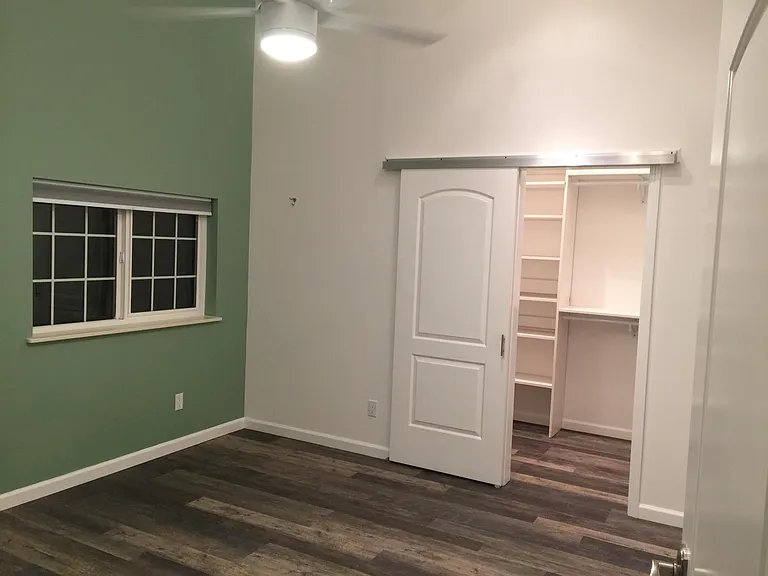 Bedroom looking into the closet