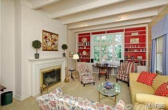 Beautiful Living Room complete with beamed ceiling.