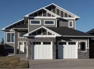 130 S Riverwood Cres SW, Diamond Valley, AB T1S6C7