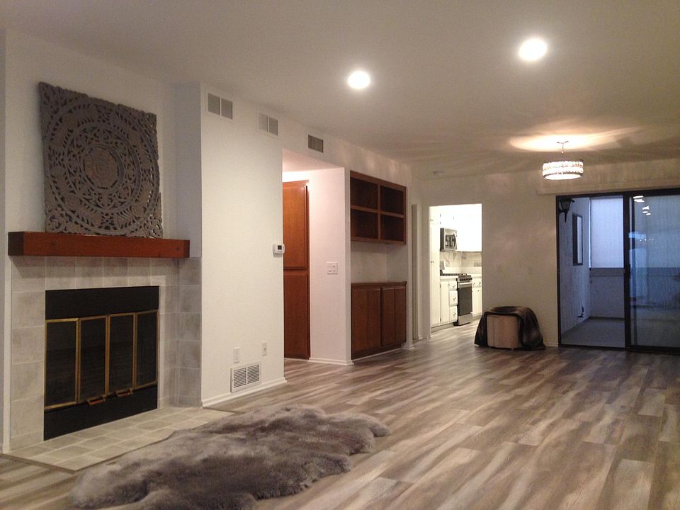 ALL NEW Classic meets modern! New recessed lighting, plank flooring, wood burning fireplace, private screened in 2nd patio with privacy blinds.