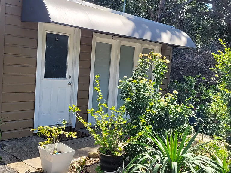 Another view of the front entry. Tenant can make the flower bed their own or leave it for the owner to tend.