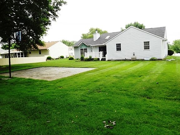 Backyard with basketball pad