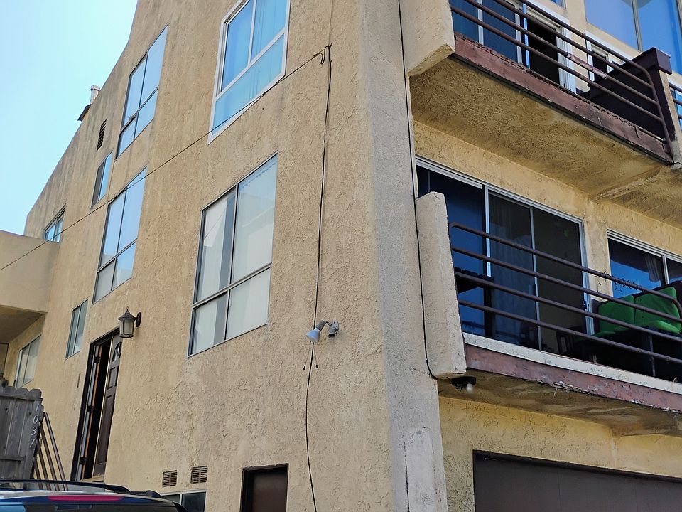 Enter from alley = Palm Ave, 1 block west of Manhattan Ave