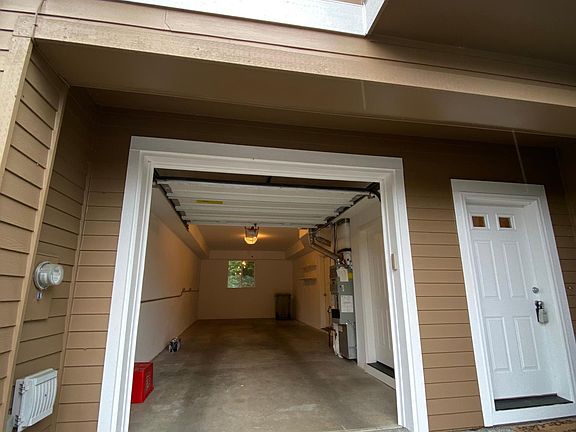 Tandem garage with storage closet on right.