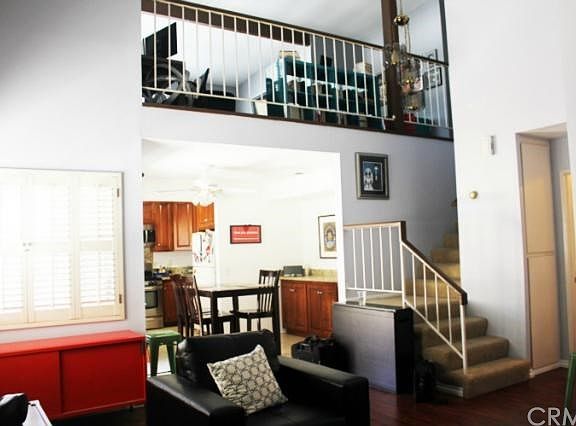 View of Loft and Dining Room From Living Room