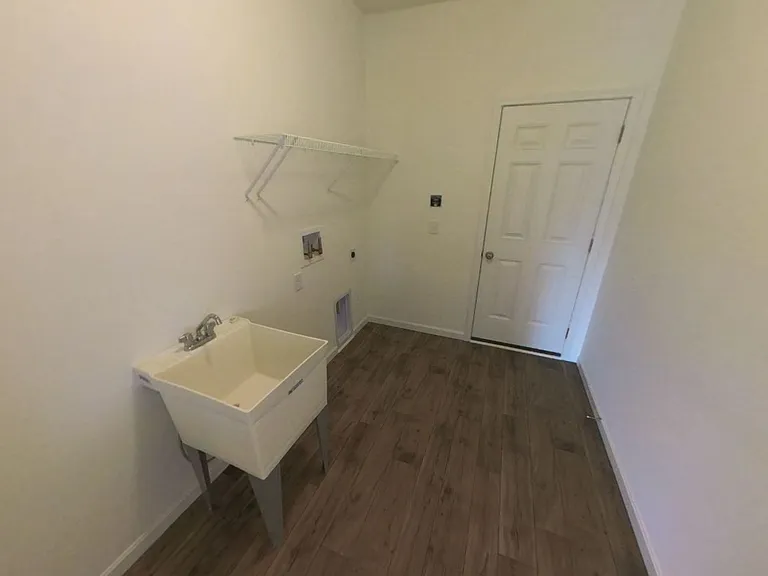 Utility room with utility sink (*NEW* Washer + Dryer included, not shown in this picture)