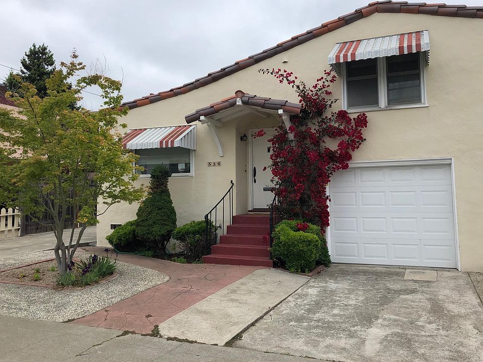 Front of house; one off-street parking space