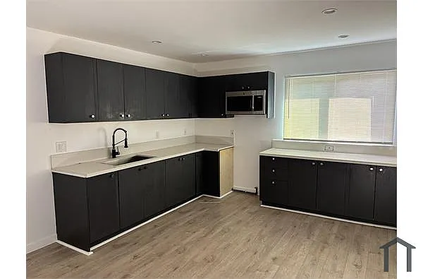 Building Photo - 9005 Orion Ave #1