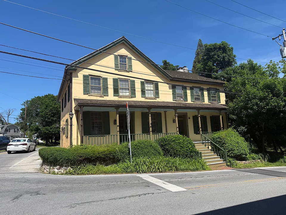 Exterior that faces Kimberton Inn with shared porch and the common entrance