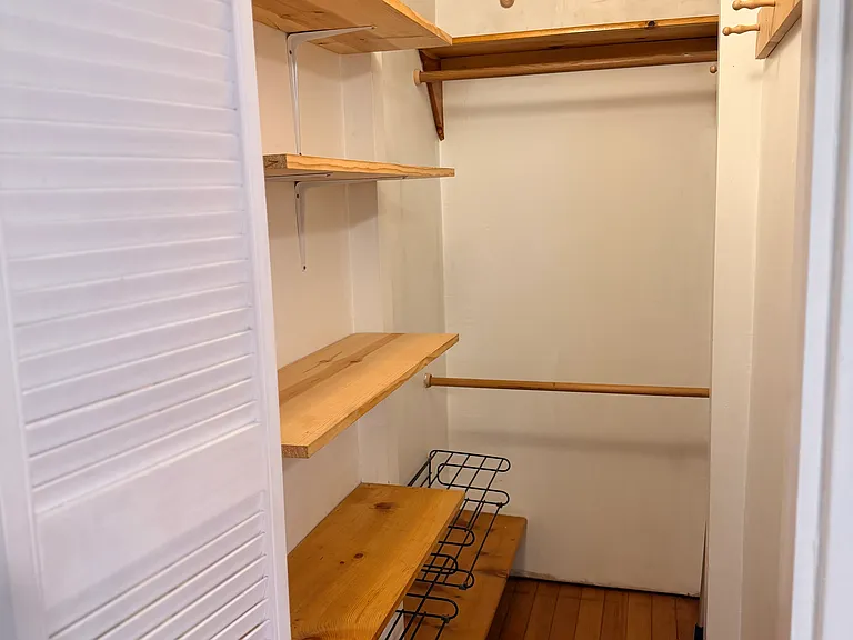 walk in closet in bedroom